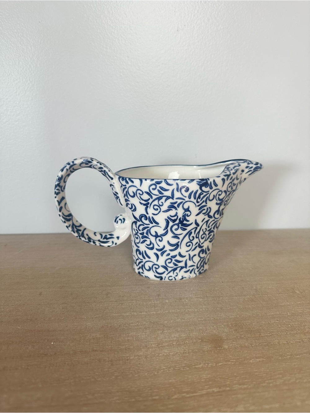 Anthropologie White Ceramic Pitcher with Navy Scroll Motif